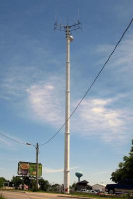 Rogers Wireless 850 & 1900 MHz antennas are located on this monopole in Strathroy, Ontario. Ericsson equipment cabinets just barely visible at the bottom. 