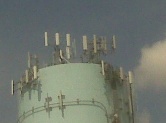 2 guys working on cell site